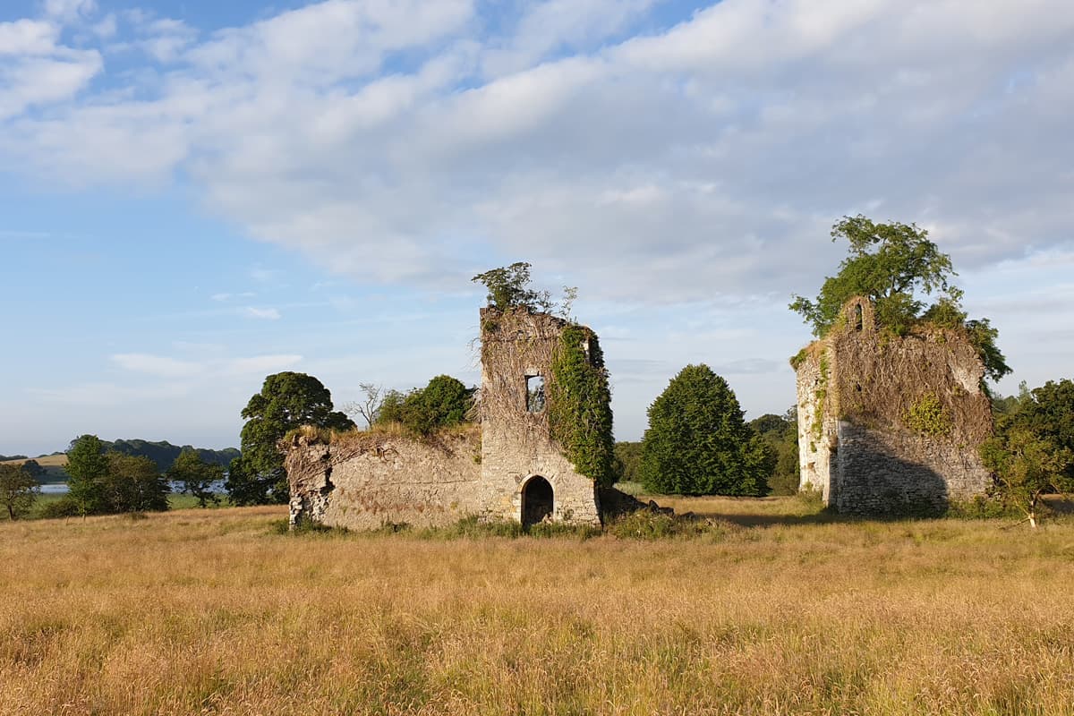 The Knights Templar castle ruins beside the lake at Temple House