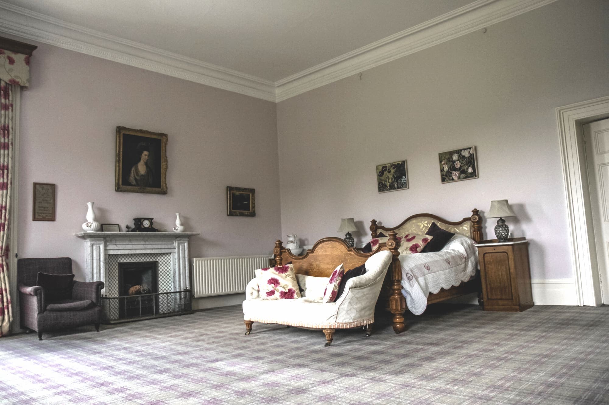A bright, high-ceilinged bedroom in the Big House at Temple House, County Sligo