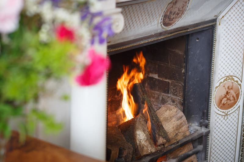 Open fire in the Morning Room at Temple House — relaxed family gatherings