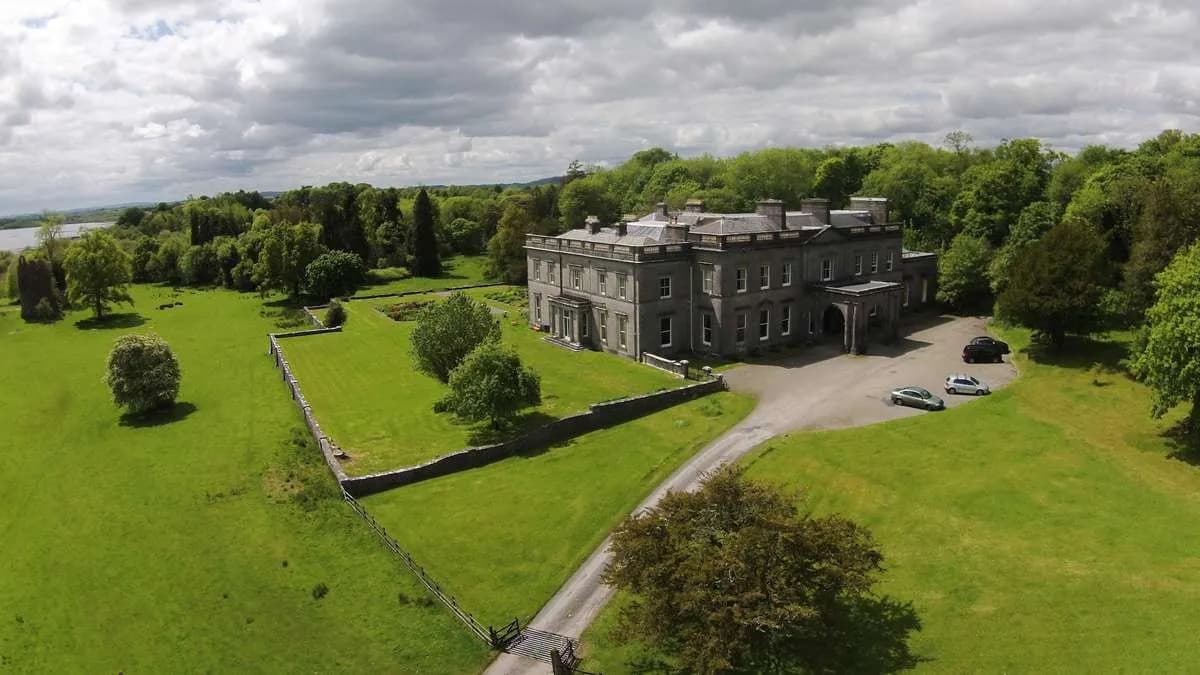 Temple House across the parkland