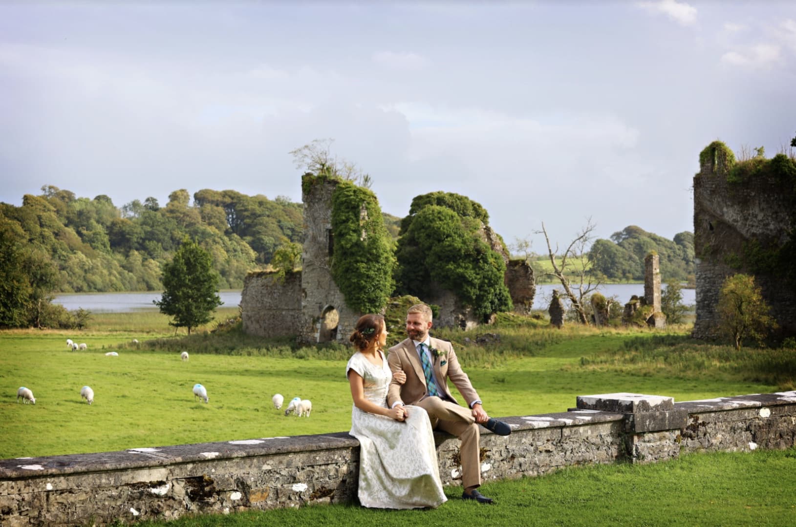 Wedding couple castle wall sheep at Temple House