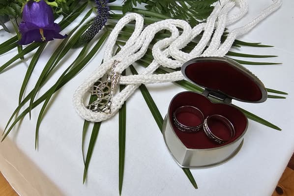 Wedding rings on a table at Temple House